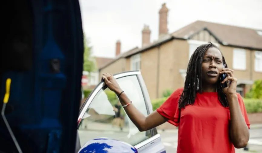 Woman calling for breakdown assistance